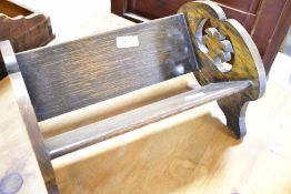 A vintage dark oak book trough, width approx. 31cm