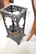 A Victorian style cast iron umbrella stand, height approx. 60cm, width 28cm, depth 22cm