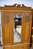 A Victorian Aesthetic style mirror door wardrobe , having drawer base, dimensions approx. Height 213