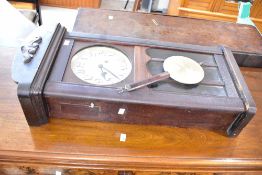 An early 20th Century stained frame wall clock having arabic numerals to silvered dial, height