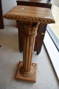 A light wood jardiniere stand, height approx. 102, width 35cm