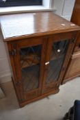 An Old Charm or similar hifi or display cabinet , dimensions approx. Width 57 depth 48 height 98cm