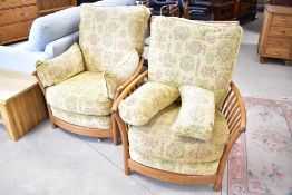 A pair of modern Ercol armchairs