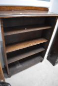 An early 20th Century oak open bookshelf (some moulding missing to one end) , width approx. 92cm,