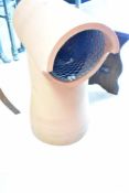 A traditional clay chimney pot, of hooded form, height approx. 59cm