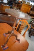 A reproduction mahogany wine table, diameter approx. 35cm, height 53cm