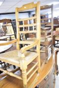 Two Victorian rush seated armchairs