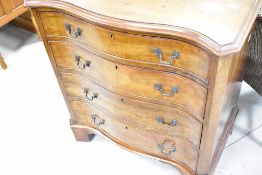 A nice quality reproduction mahogany serpentine fronted chest of four drawers, in the 19th Century