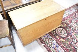 A natural pine bedding box having cast handles, dimensions approx. Width 93 depth 47 height 48cm