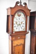 A 19th Century long cased clock having 8 day movement and painted arch Roman numeral dial, named for