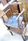 A 19th Century oak childs carver/high chair, width approx.39cm