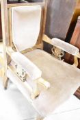 A Victorian mahogany or walnut framed easy chair having later dralon upholstery