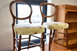 A pair of Victorian stained frame balloon back bedroom chairs