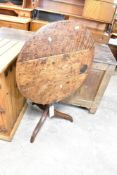 A 19th Century mahogany pedestal table having snap top , with turned column and triple splay legs,