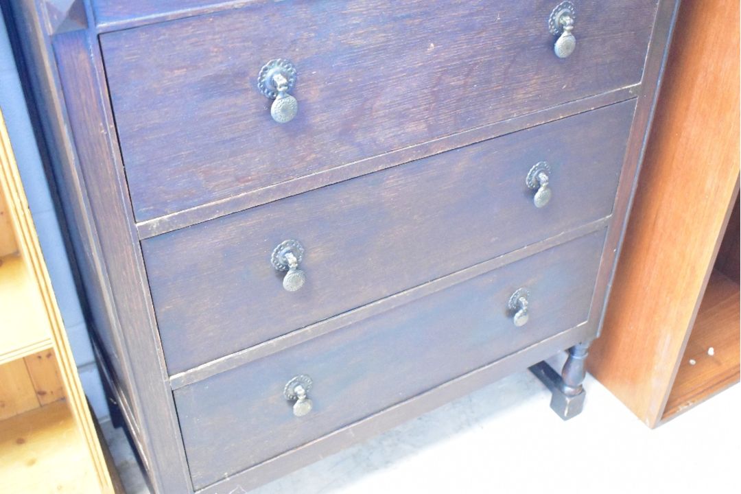 An early 20th Century oak chest of three long drawers , having turned frame, dimensions approx. - Image 1 of 2