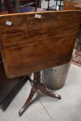 A Victorian mahogany snap top occasional table on turned column and triple splay legs, approx. 56