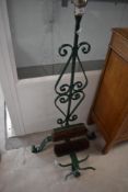 A wrought iron boot cleaner and remover