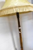 A traditional oak standard lamp
