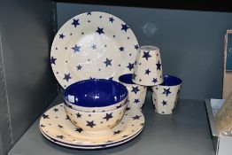 A small selection of Emma Bridgewater bamboo melamine 'Blue Star' tableware, to feature three dinner