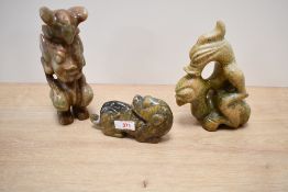 Three Chinese Hongshan-style hardstone figures, thought to be jade, comprising anthropomorphic