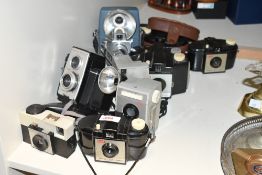 A selection of twelve vintage Kodak cameras including Brownie Reflex20, Brownie Flash 20, four