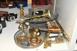 A quantity of late 19th to 20th-century metal ware, to feature brass candlesticks, a brass inkwell