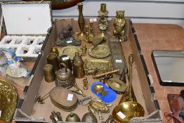 A quantity of late 19th to early 20th-century brassware, to feature a standing ear money box; a