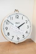 A vintage Blick metal industrial factory wall clock, of Arabic hours, marked to dial, 31cm diameter,