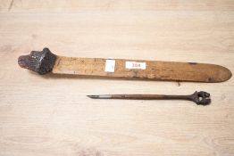 A fine late 19th to early 20th-century Black Forest wooden bear page turner, featuring a charming