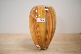 A vintage Murano-style studio art glass vase, featuring vertical feathered stripes of orange, yellow