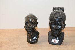 Two accomplished late 20th-century African hard stone figural busts, to feature a male and female,