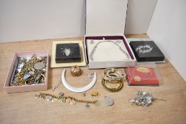 An assortment of costume jewellery, including boxed pieces, bangles and statement pieces