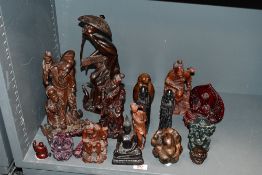 A collection of Eastern carved wooden figures (7), various depictions of immortals, sages and