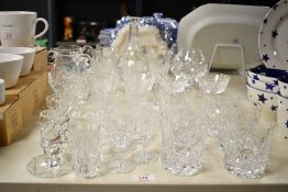 A selection of mixed crystal glass wares, various including tumblers, brandy glasses, sherry glasses