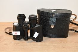 Vintage Soviet-era 8x30 binoculars, with leather carry case, marked, condition consistent with age