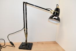 A contemporary Anglepoise Original 1227 desk lamp in black, featuring a gloss paint finish,