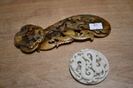 A fine Qing dynasty-style Chinese carved hard stone plaque featuring traditional aquatic creatures