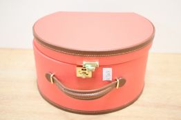 A Friedrich/23 (Germany) Ascot jewellery/vanity case, in coral with three internal drawers and
