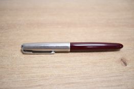 A Parker 51 aeromatric fill fountain pen in Burgundy with a lustraloy cap