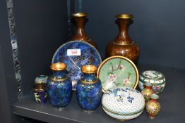 A quantity of 20th-century Chinese cloisonné ware, featuring colourful floral metal inlay,