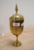 A 19th/early 20th century Indian urn or lidded goblet, the finial topped domed cover over a