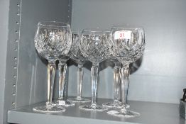 Six late 20th-century Waterford crystal 'Lismore' wine glasses, featuring a diamond and wedge cut
