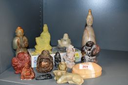 A quantity of 20th-century mainly Chinese, Indian and African hardstone figures, to feature a