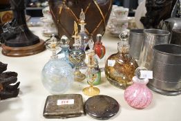 A quantity of late 19th to 20th-century art glass perfume/scent bottles, to feature a Victorian