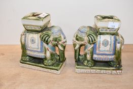 Two vintage Hollywood Regency-style ceramic elephant ash trays, featuring vibrant blue and green