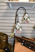 A tall late 20th-century Tiffany-style floor lamp, featuring two pink floral shades on curved '