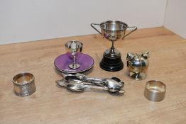 Two hallmarked silver napkin rings 57grams gross, sold along with an interesting duel condiment, a