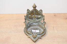 A vintage Indian brass Vaishnava oil lamp, featuring ornate decoration, unmarked, 12.5cm,