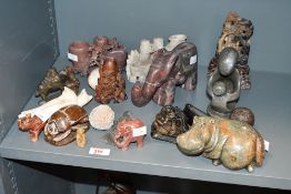 An interesting collection of Chinese, African and other carved stone items, including Chinese