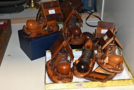 A selection of unusual vintage Folk Art-style wooden carvings, to mainly depict 'The Old Woman who